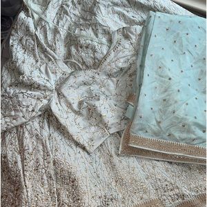 Mint green and gold embroidery lehengha choli